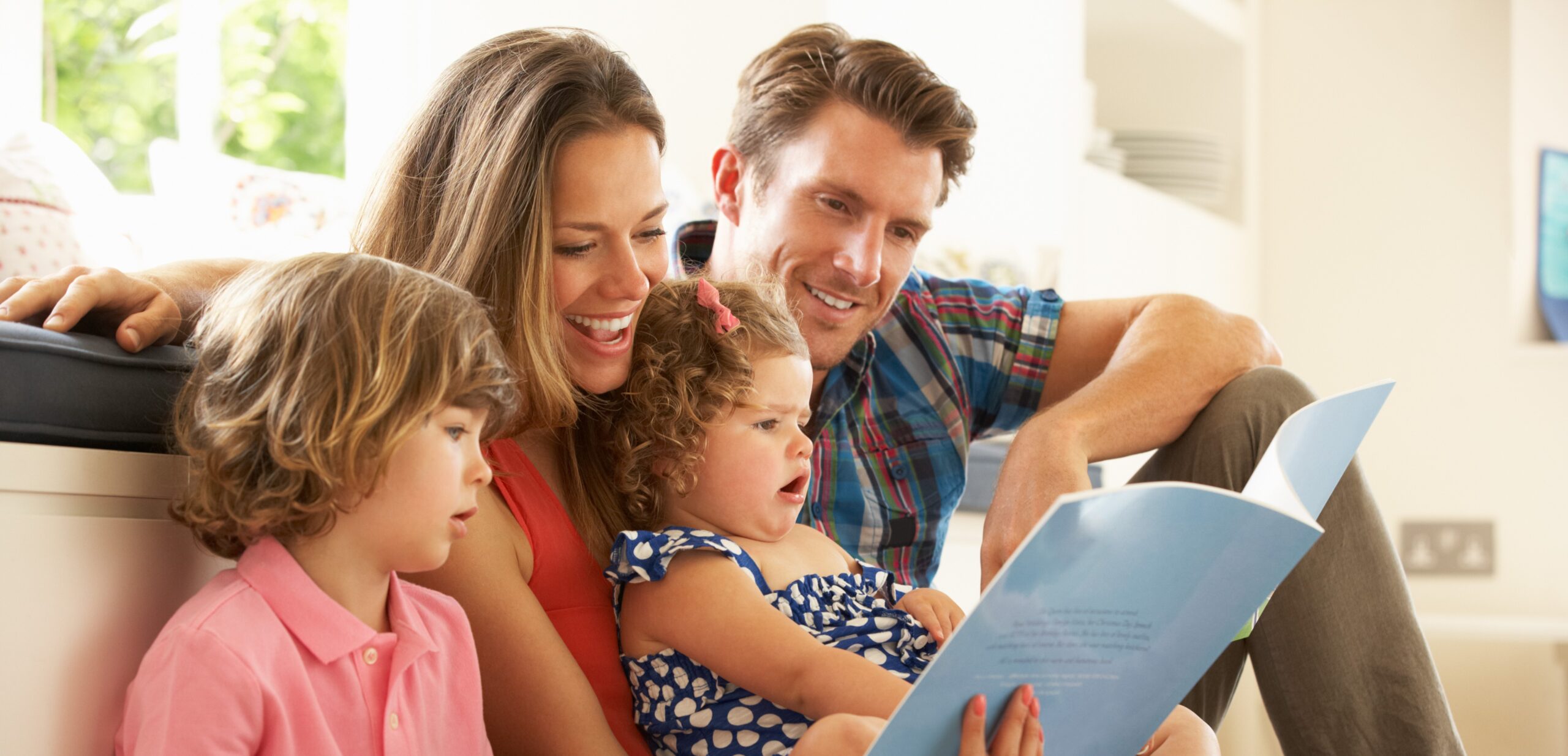 Family Reading A Book